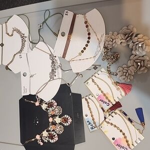 Bundle of five necklaces and three bracelets/ costume jewelry